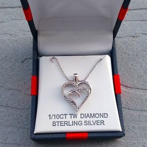 Sterling silver heart pendant with diamonds
